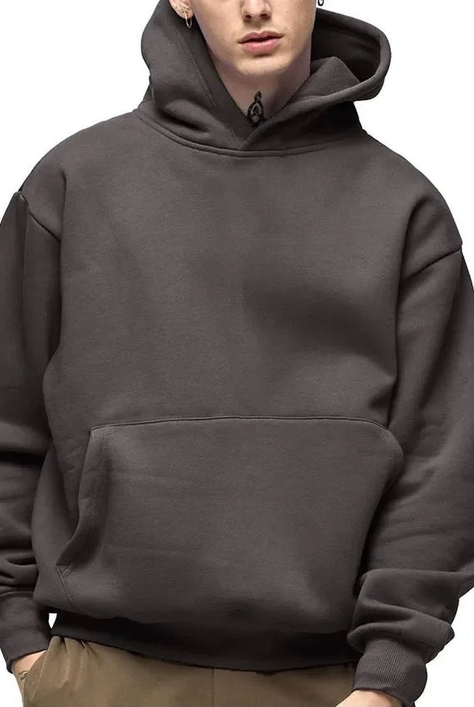 Men's heavyweight cotton hoodie in dark grey, worn, front view