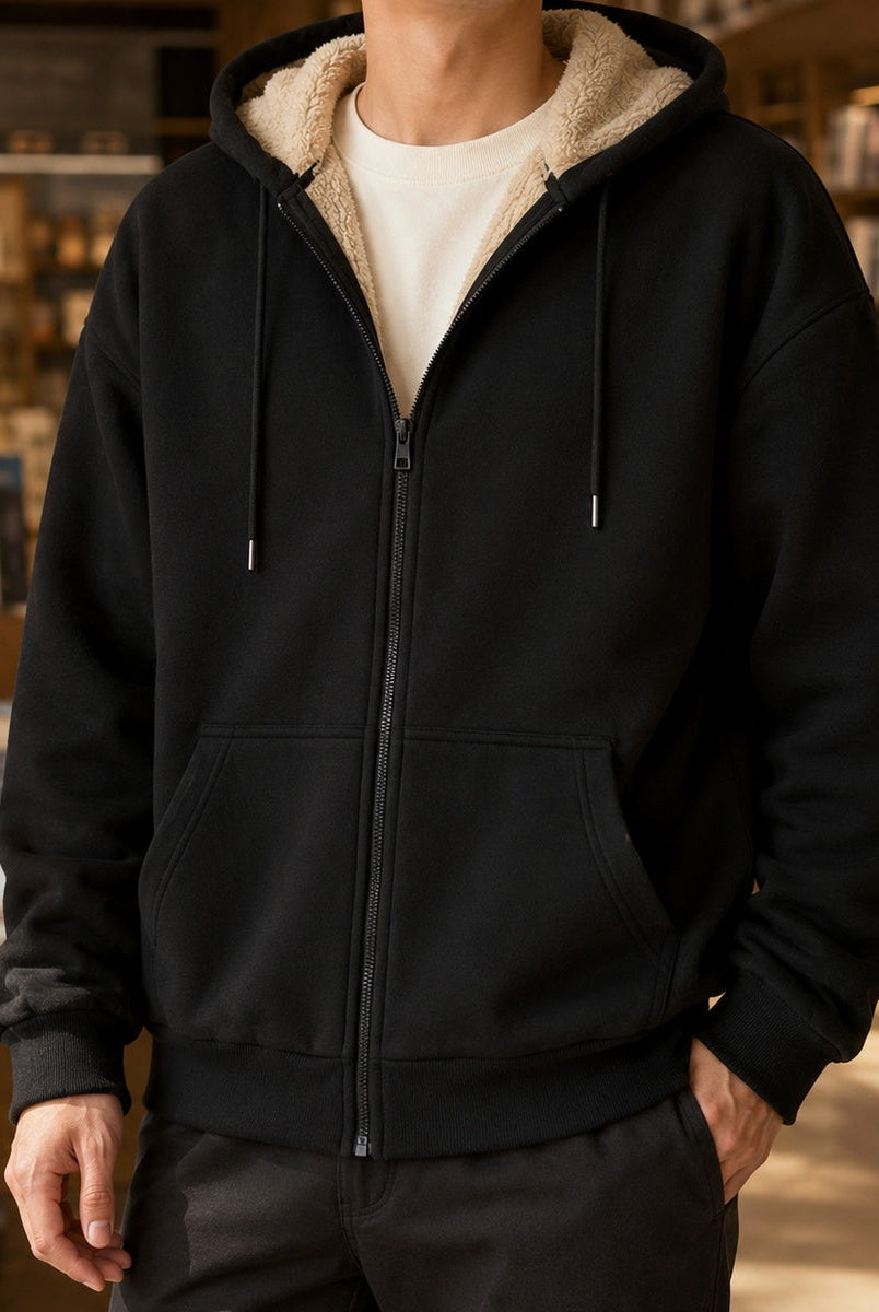 Men's zip-through hoodie in black, worn, front view