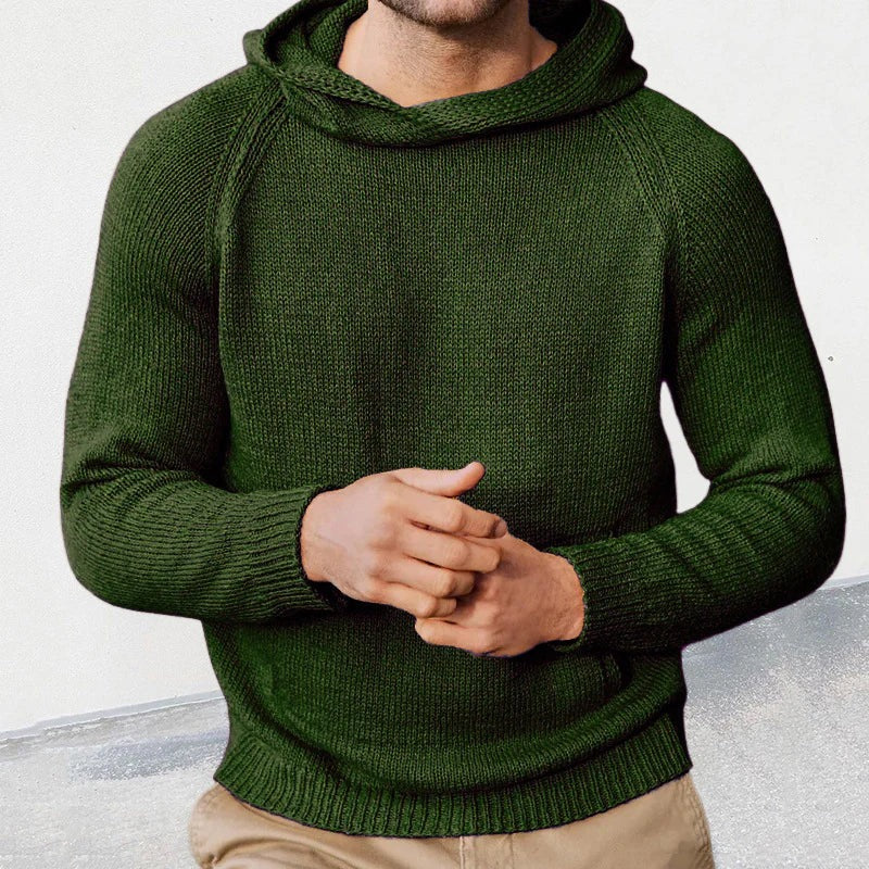 Men's knitted hooded jumper in dark green, worn, front view