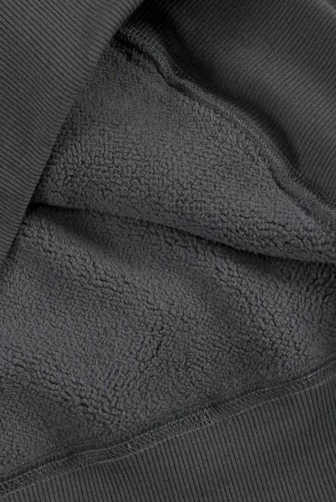 Men's heavyweight cotton hoodie in dark grey, close-up of the soft brushed inside