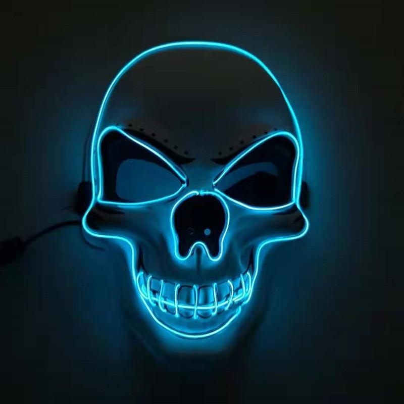 Light blue LED skull mask glowing in the dark