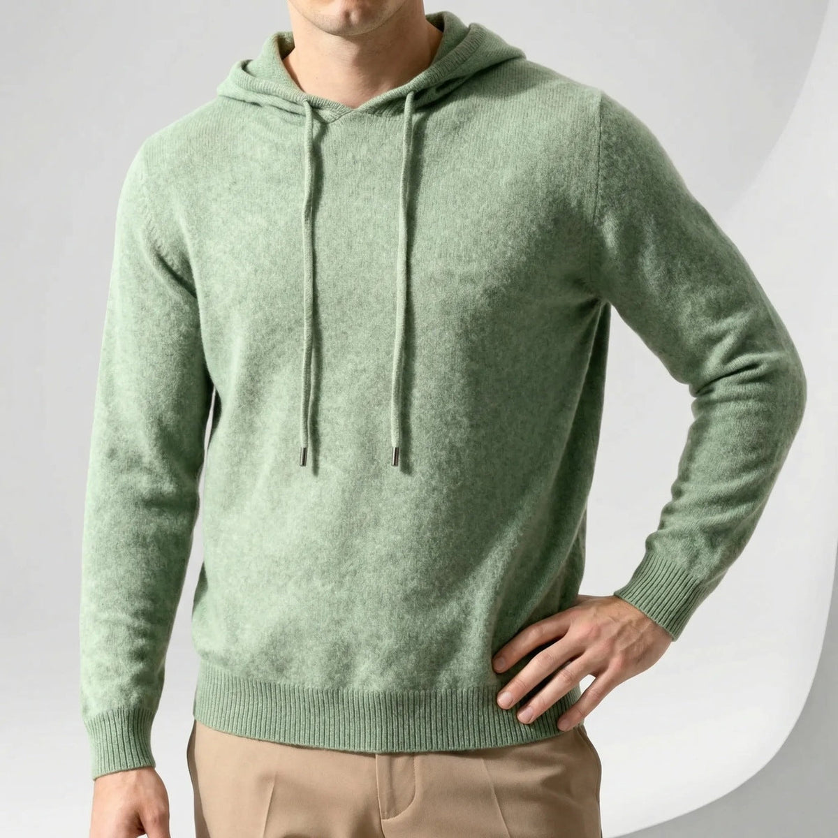 Men's fine-knit hooded jumper in sage green, worn, front view