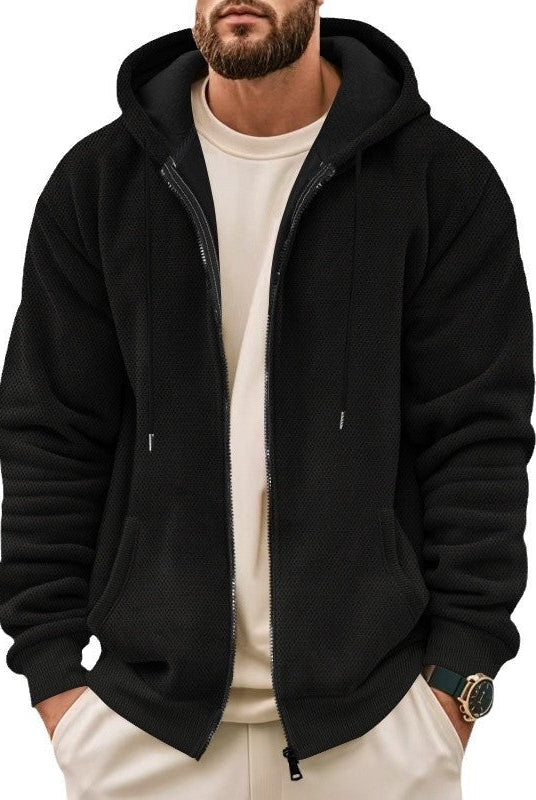 Men's waffle zip hoodie in black, worn, front view