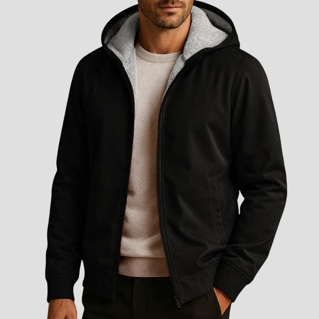 Men's sherpa-lined zip hoodie in black, worn, front view