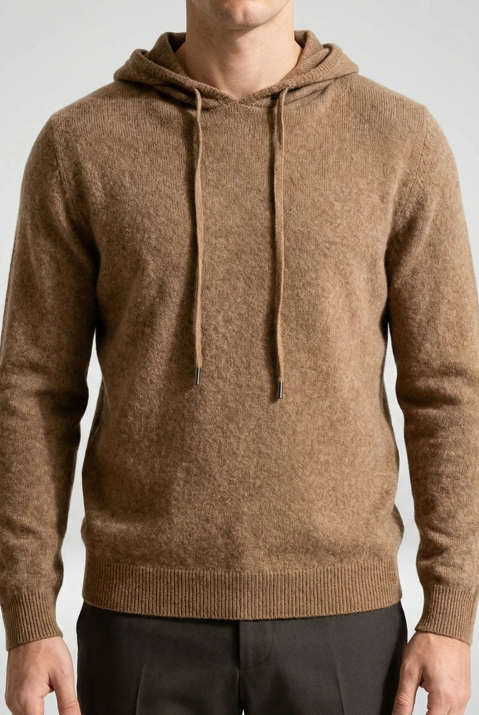 Men's fine-knit hooded jumper in brown, worn, front view with the arms at the sides