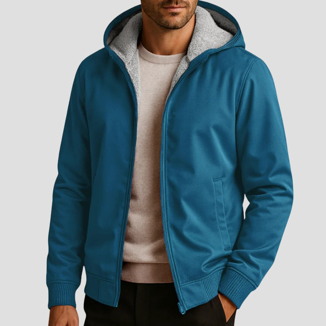 Men's sherpa-lined zip hoodie in petrol blue, worn, front view