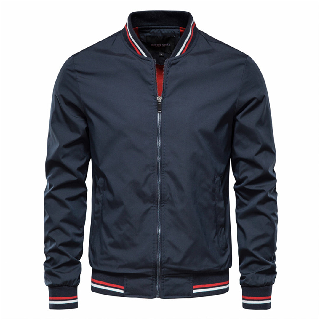Navy blue bomber jacket with red white striped trim, worn by model | Chaps London