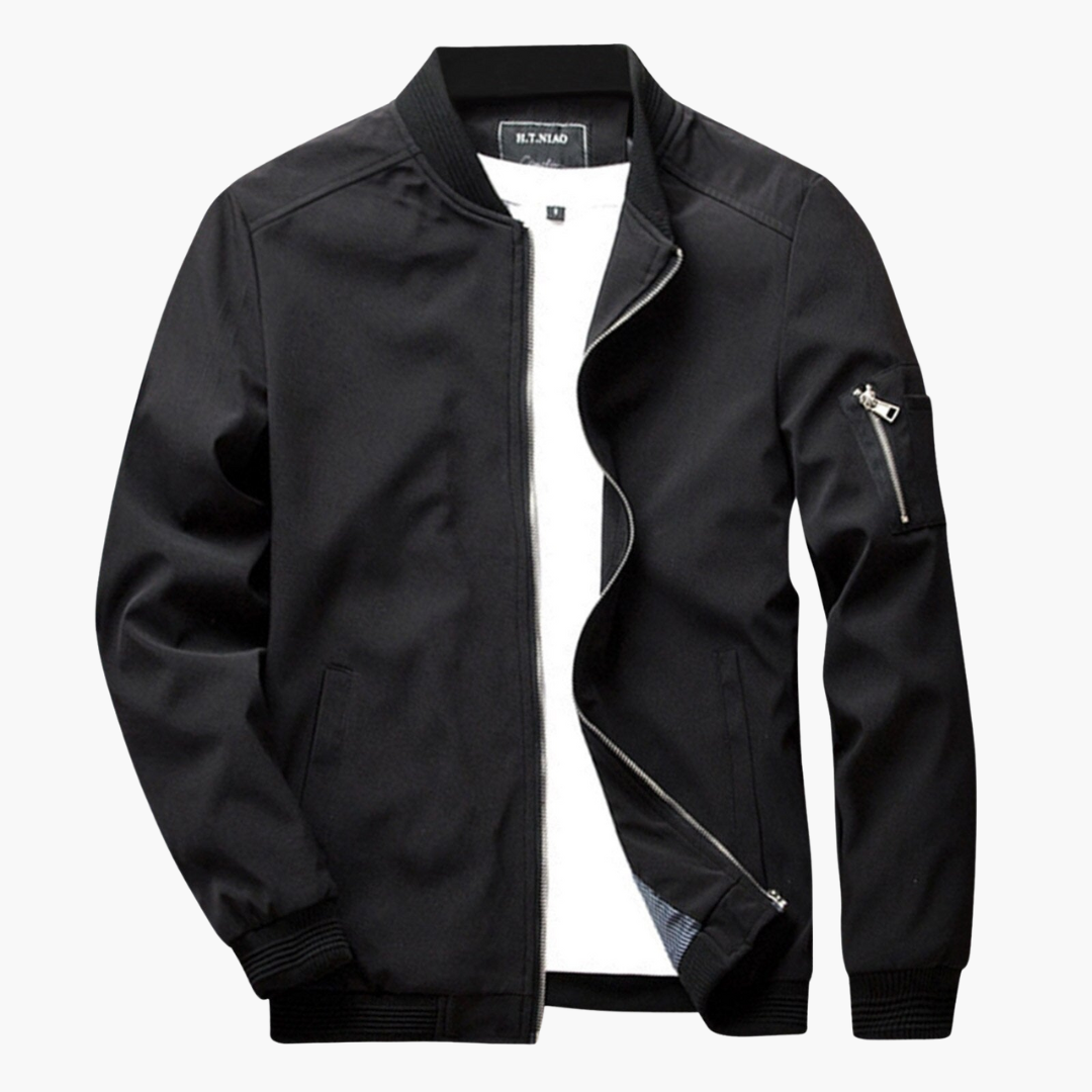 Black bomber jacket with zip pockets, worn open over white shirt | Chaps London
