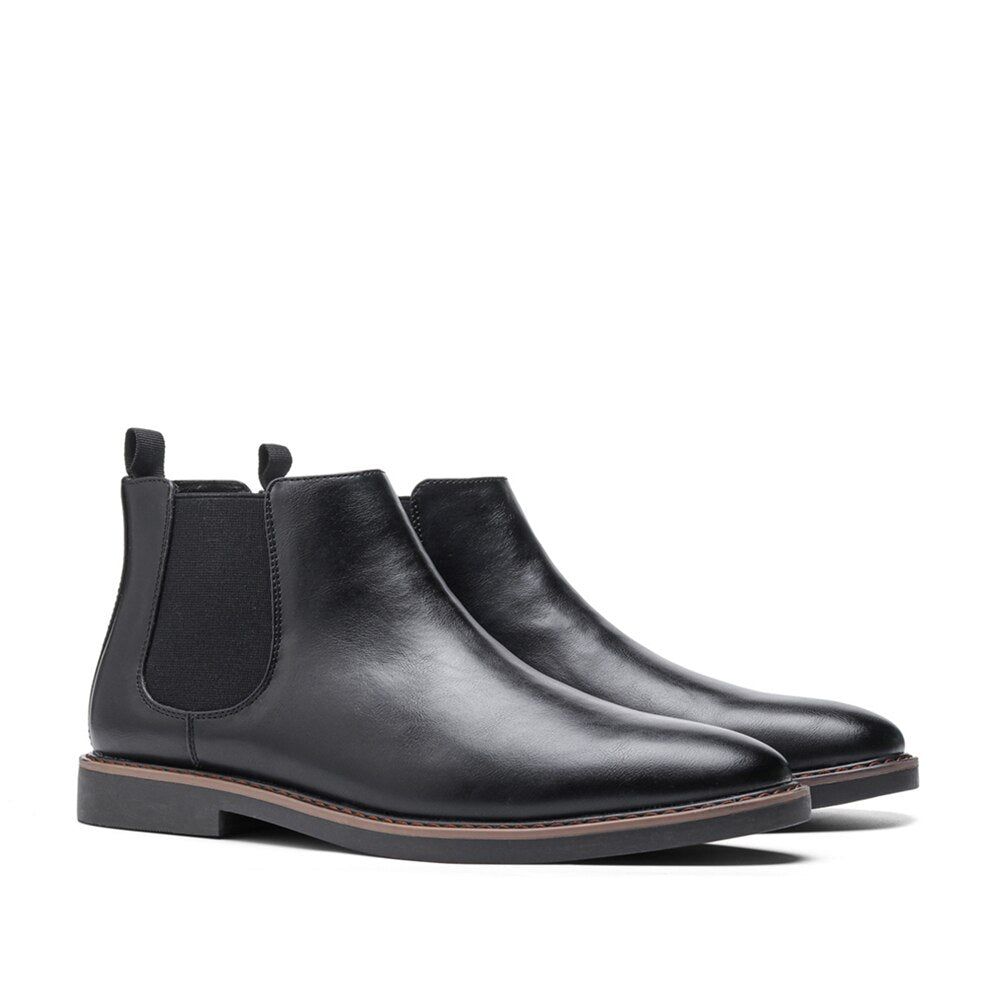Black leather Chelsea boots with elastic side panels, shown as a pair | Chaps London