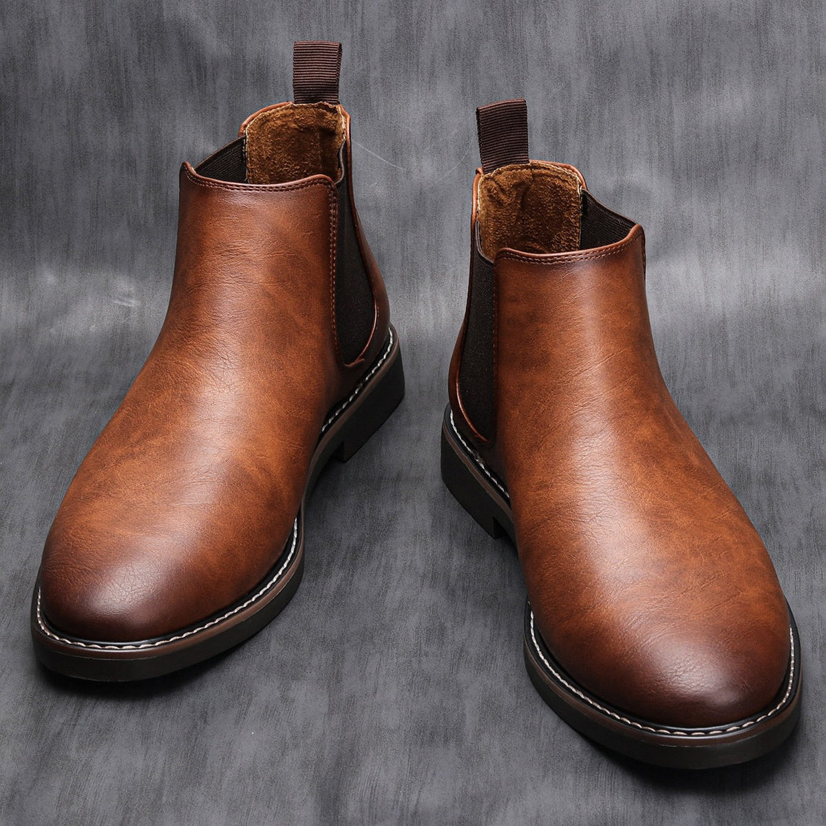 Brown leather Chelsea ankle boots with pull tabs, shown as a pair | Chaps London