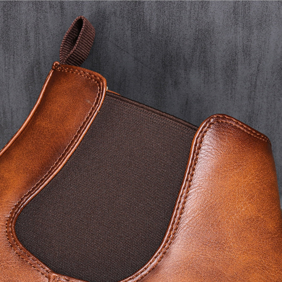 Close-up of brown leather Chelsea boot with elastic side panel detail | Chaps London