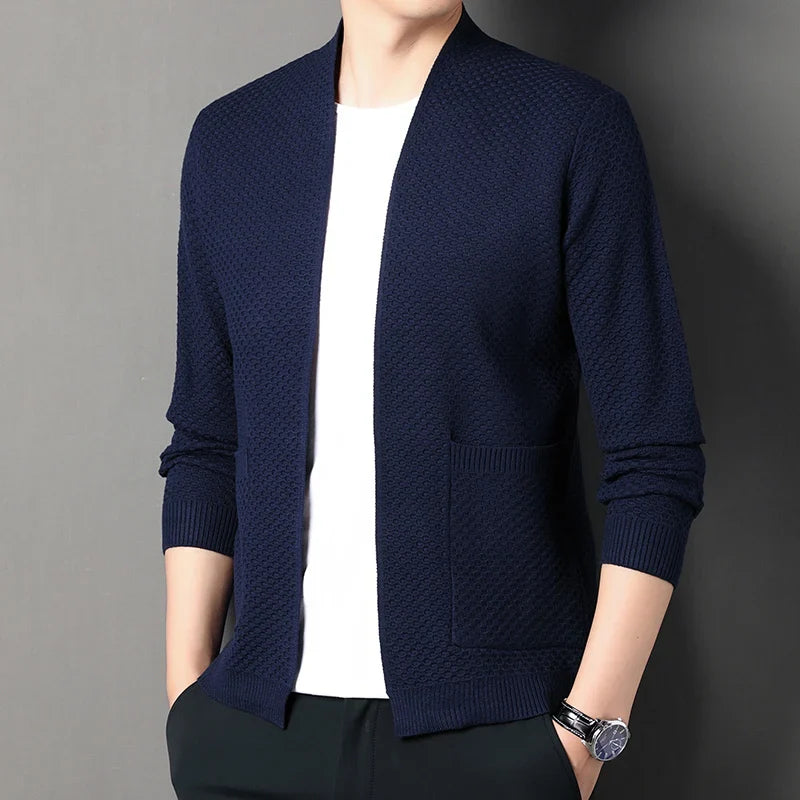 Man wearing navy knitted textured cardigan with open front, worn casually | Chaps London