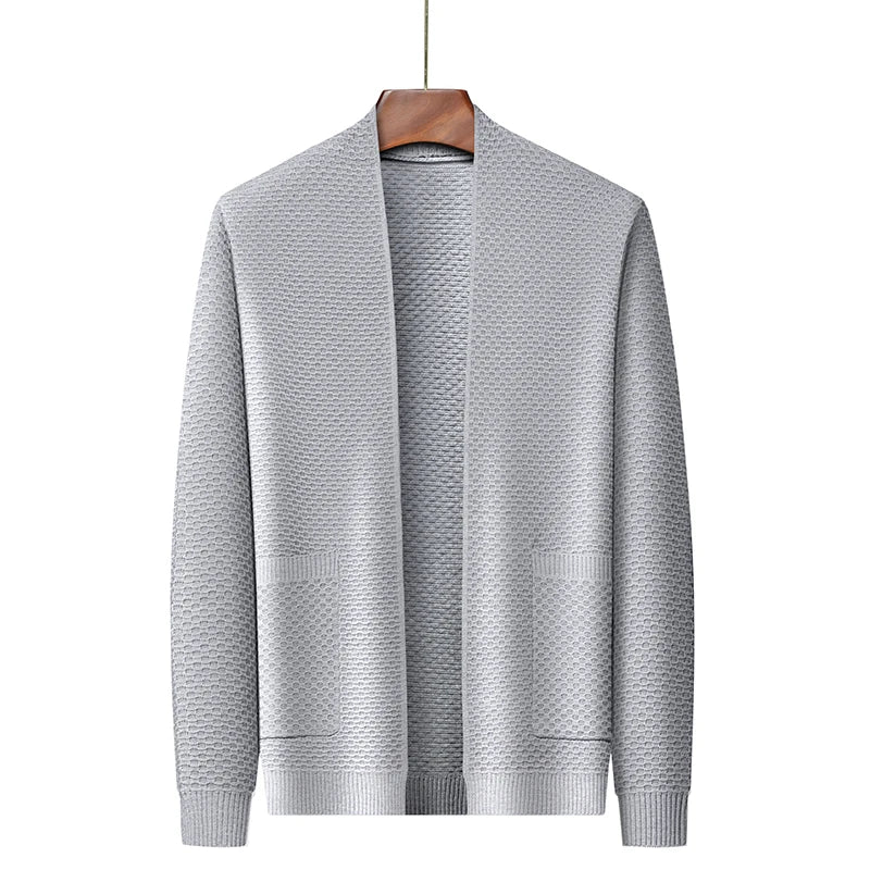 Gray knitted open-front cardigan with textured pattern, hanging on wooden hanger | Chaps London