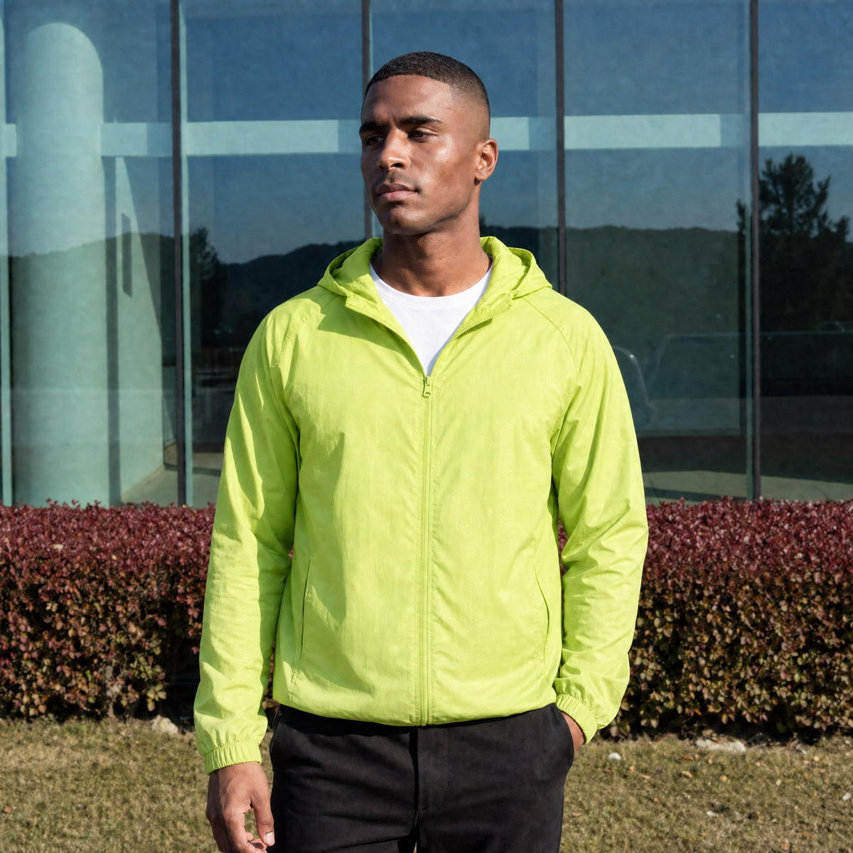 Men's lightweight hooded windbreaker jacket in light green