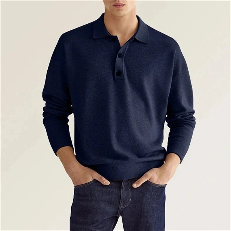 Man wearing navy blue long-sleeve collared polo sweater with denim jeans | Chaps London