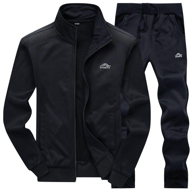 Black zip-up tracksuit jacket and matching pants, laid flat, sports logo | Chaps London