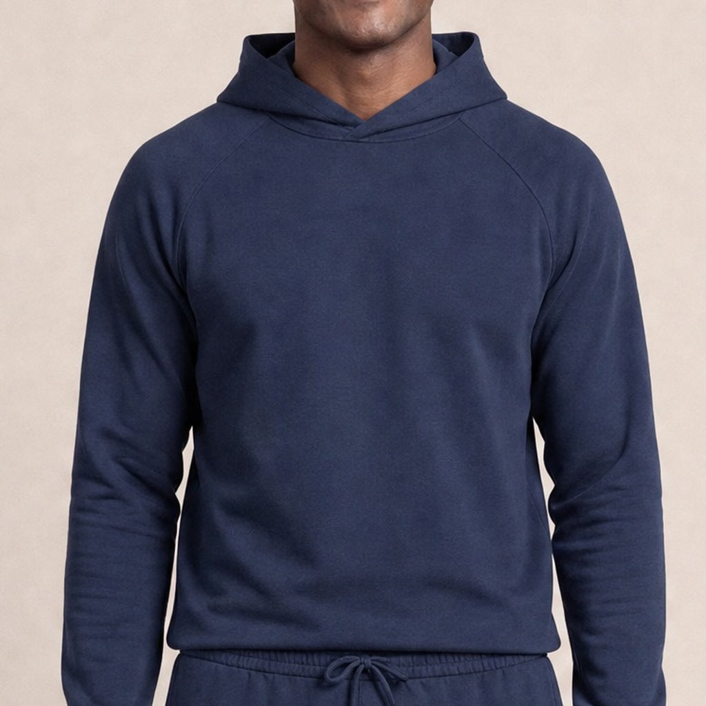Man wearing navy raglan hoodie, worn, front view, close-up torso | Chaps London