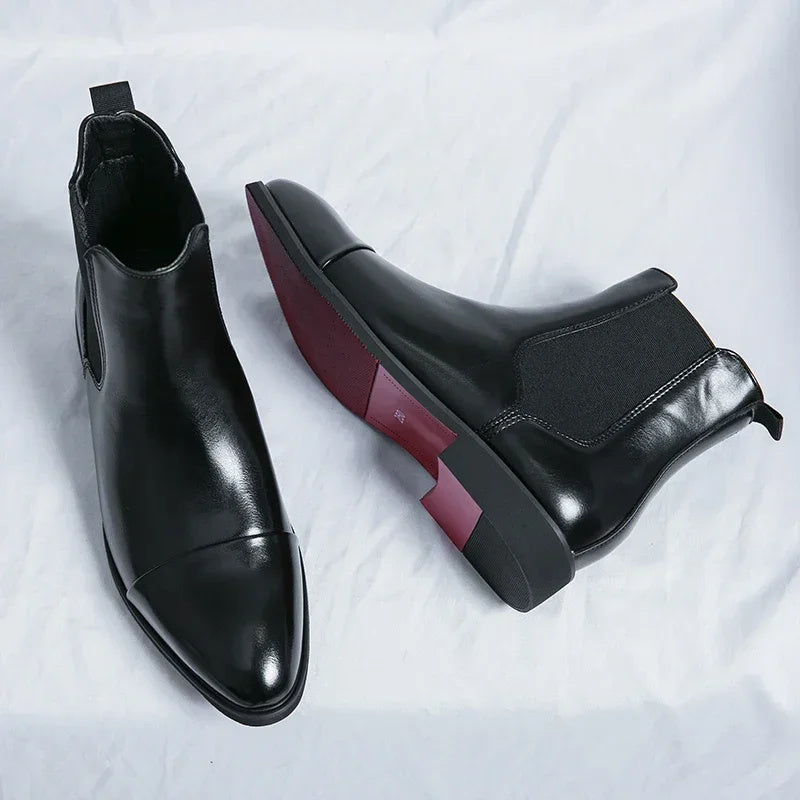 Black faux leather Chelsea boots with red sole, flat lay pair view | Chaps London