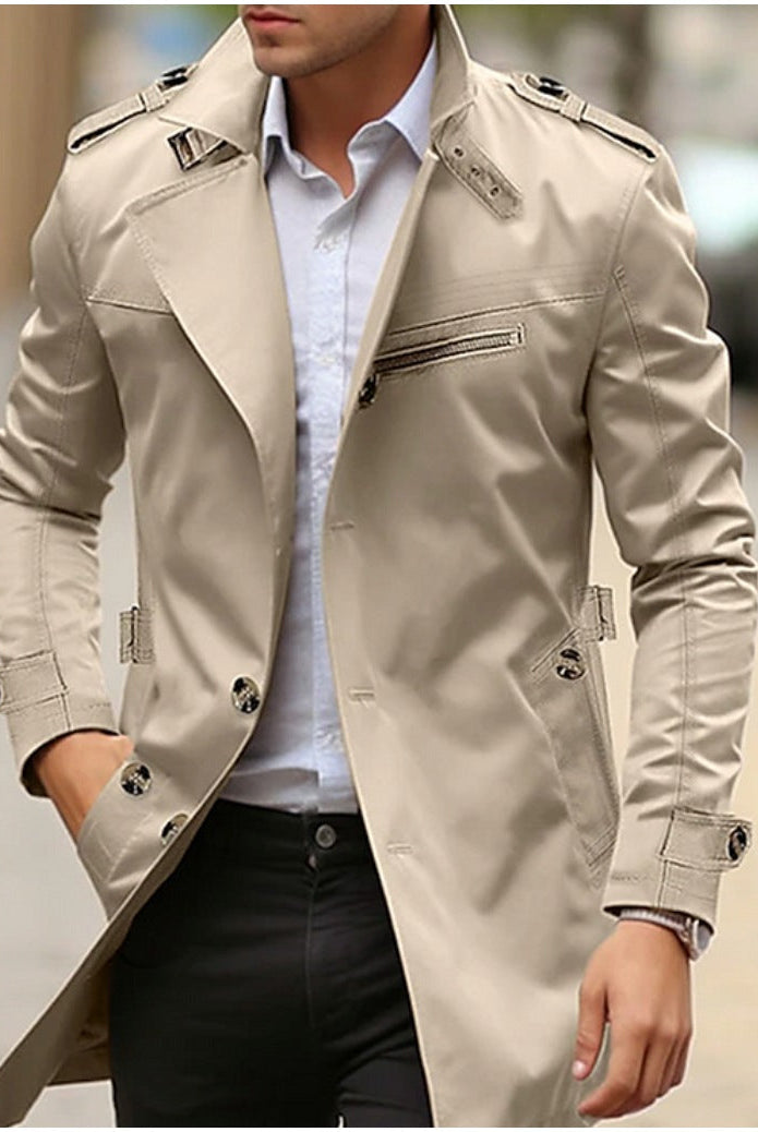 Beige double-breasted trench coat with epaulettes worn by man outdoors | Chaps London