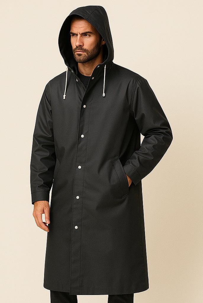 Man wearing black hooded long raincoat with drawstrings and press stud closures | Chaps London