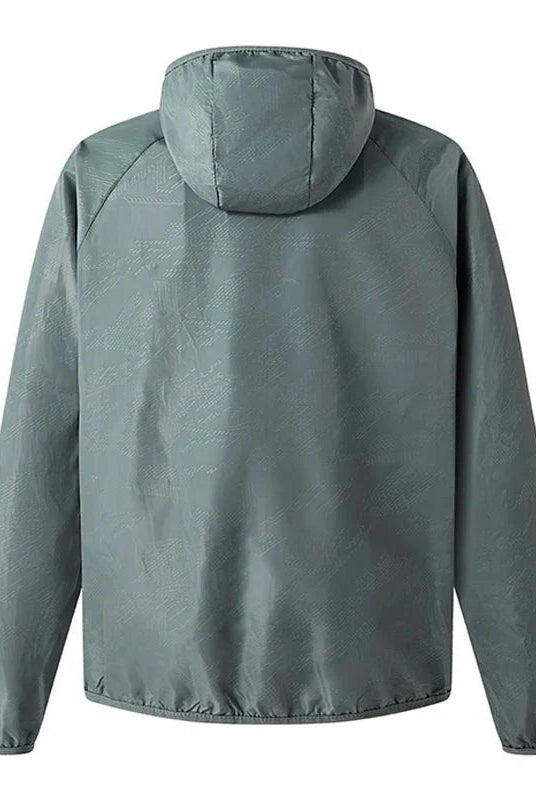Gray hooded windbreaker jacket, back view, worn by person, textured fabric | Chaps London