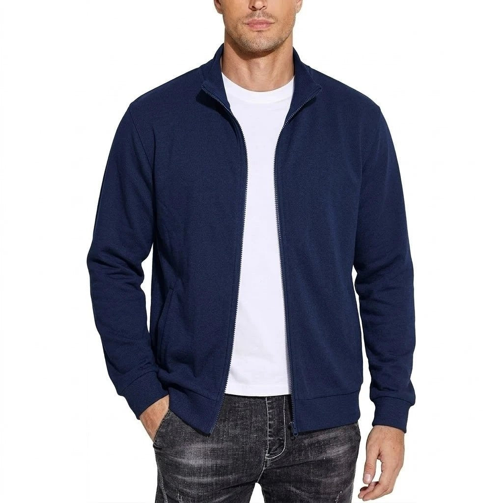 Man wearing navy zip-up jacket with stand collar, white shirt underneath | Chaps London