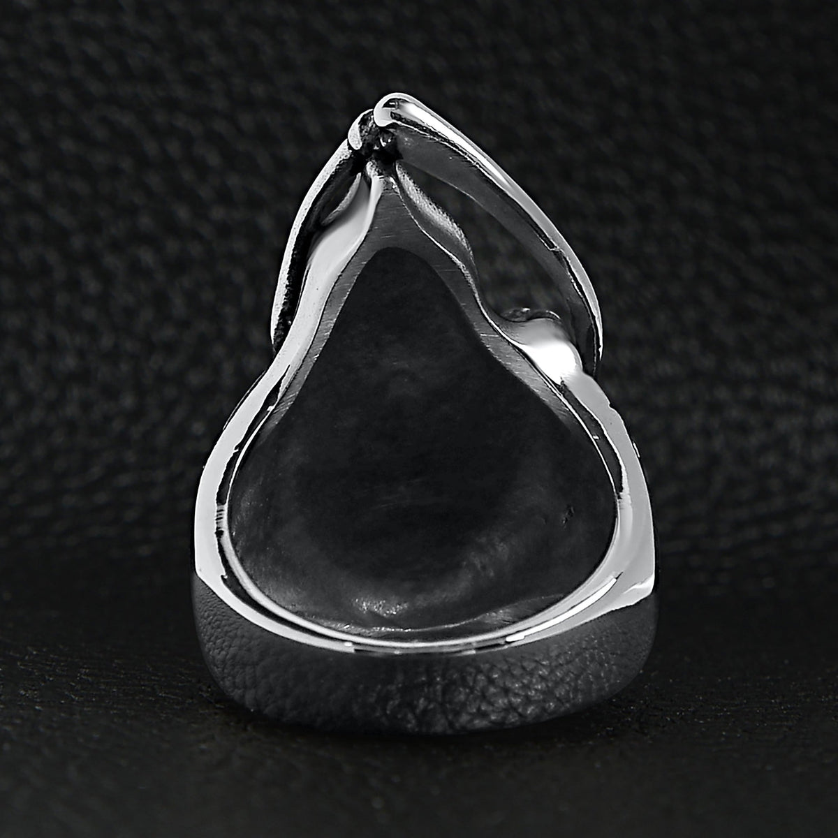 Silver hooded ring with teardrop shape shown flat on black | Chaps London
