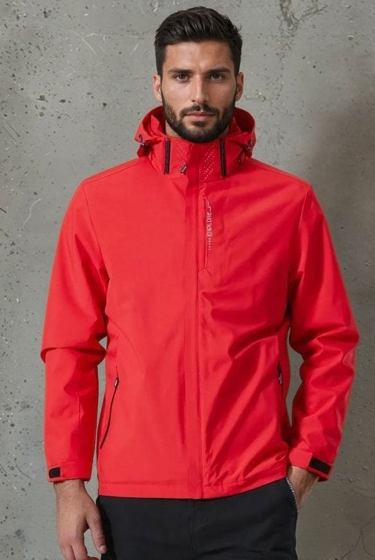 Man wearing red hooded waterproof jacket with zip pockets, standing against concrete wall | Chaps London