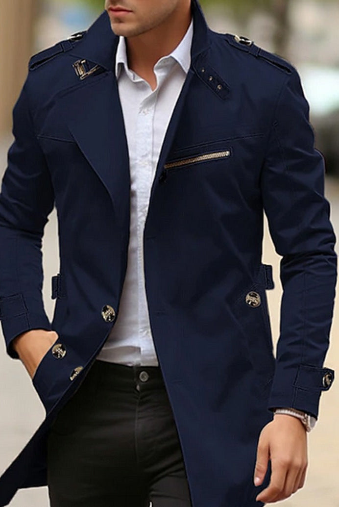 Navy blue slim-fit trench coat with epaulettes worn by man outdoors | Chaps London