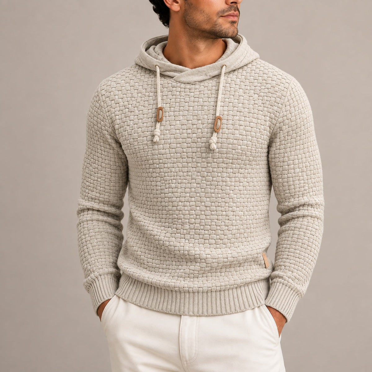 Man wearing beige basket weave knit hoodie with drawstring toggles | Chaps London