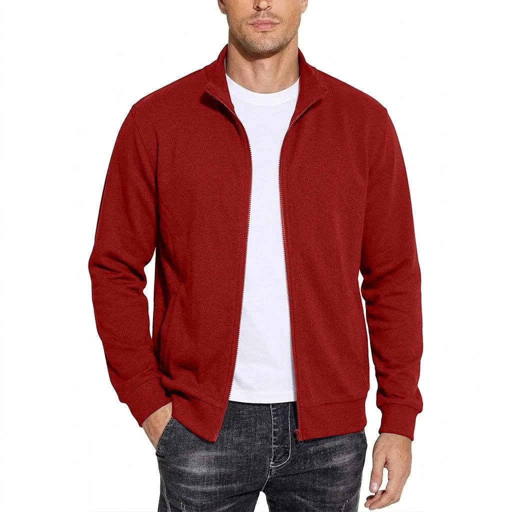Man wearing red zip-up jacket with stand collar over white shirt | Chaps London
