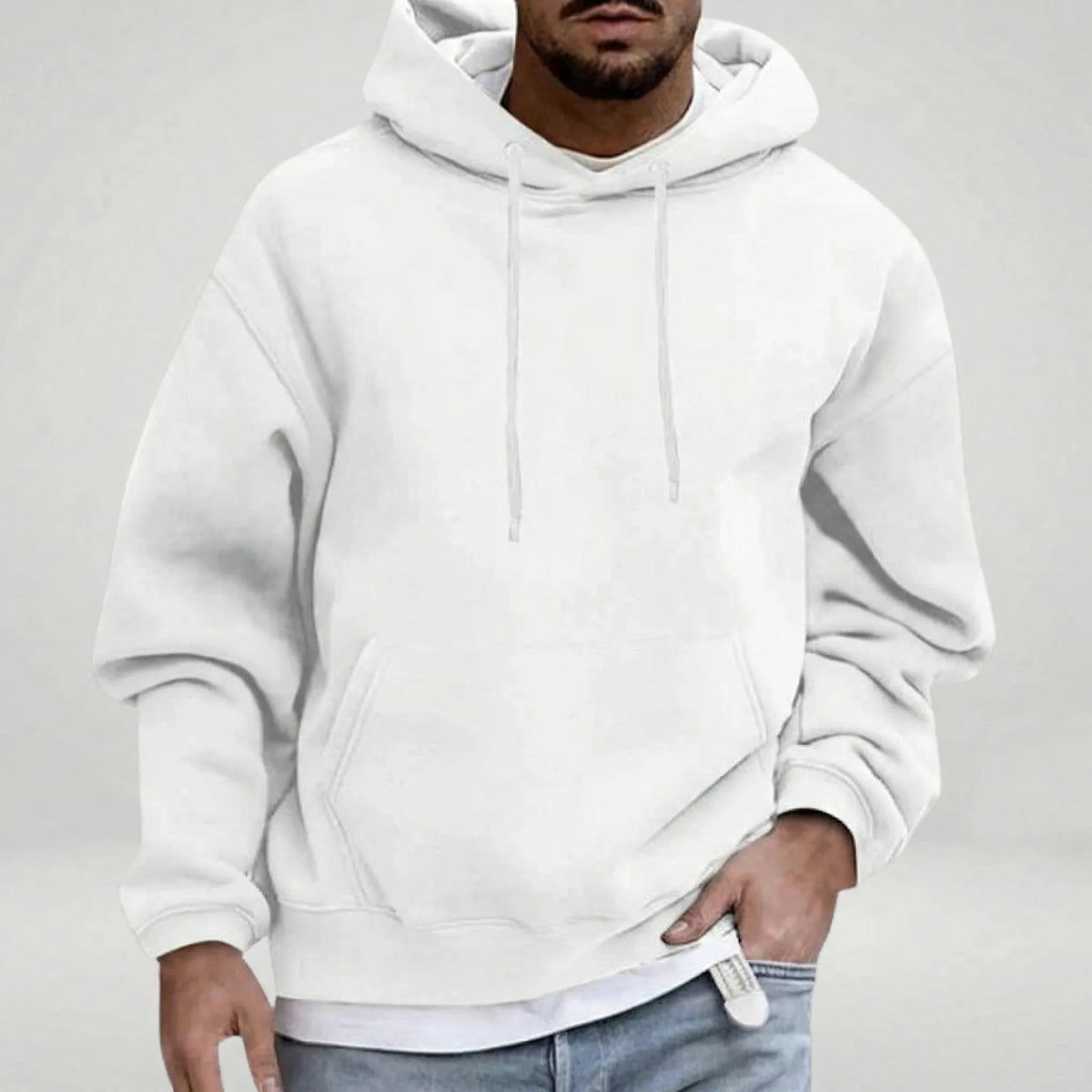 White pullover hoodie with drawstrings, worn by man, layered over white shirt | Chaps London