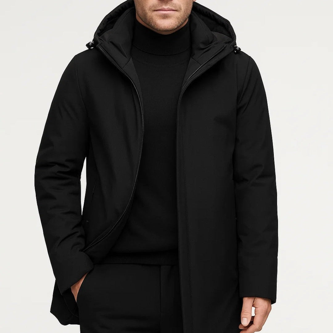 Man wearing black hooded parka with turtleneck sweater and trousers | Chaps London