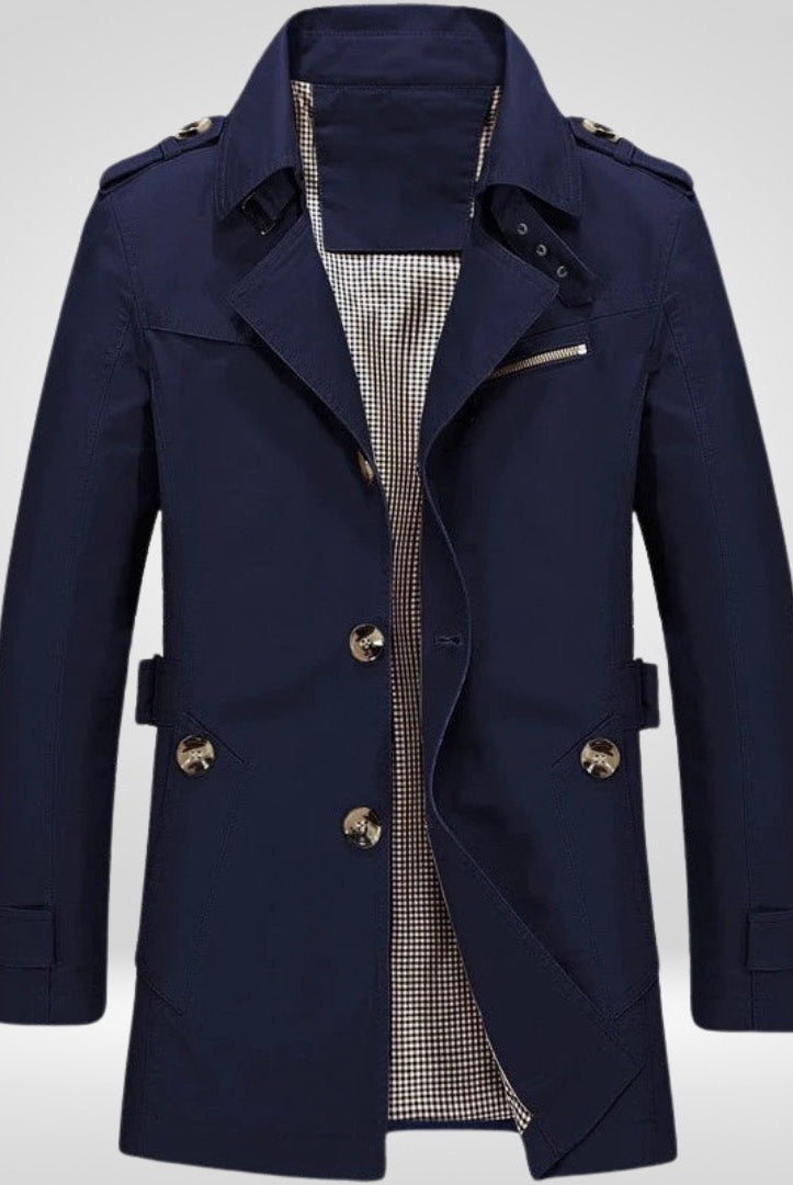 Navy blue single-breasted trench coat with epaulettes, displayed on mannequin, checkered lining visible | Chaps London