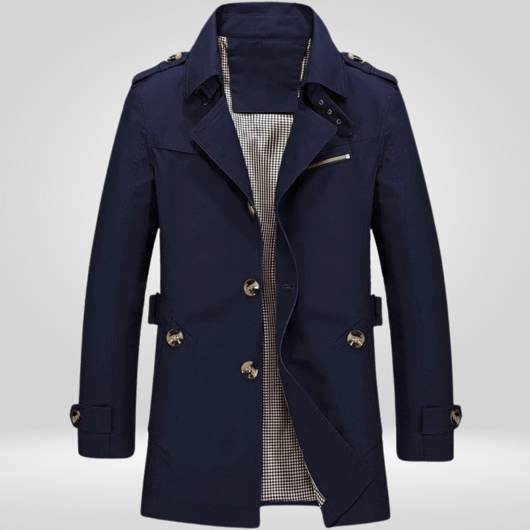 Navy blue single-breasted trench coat with epaulettes, displayed on mannequin, checkered lining visible | Chaps London