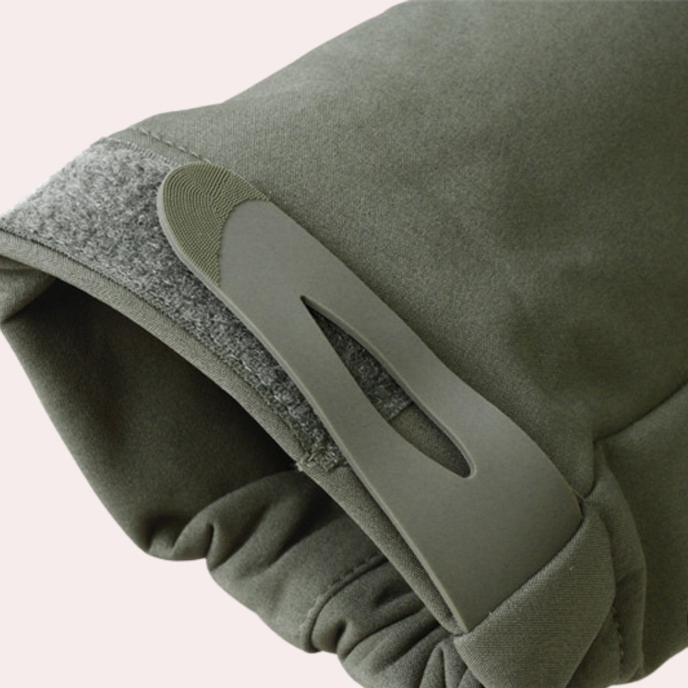 Green softshell jacket close-up showing hood zipper pull and fleece lining texture | Chaps London