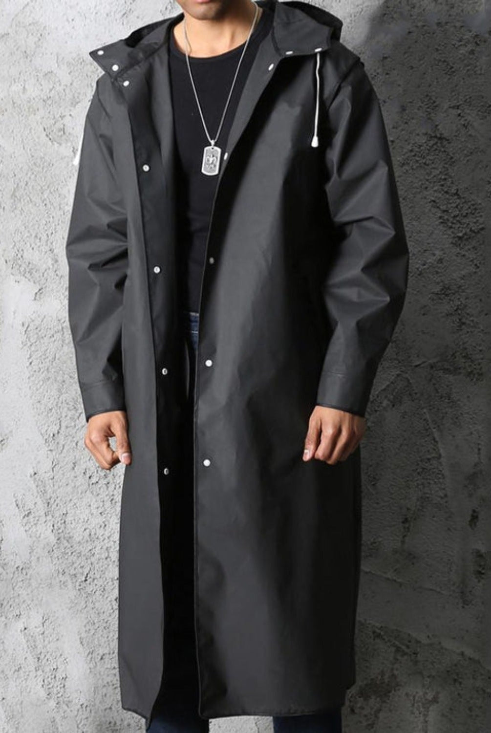 Man wearing long black hooded raincoat with front snap buttons | Chaps London