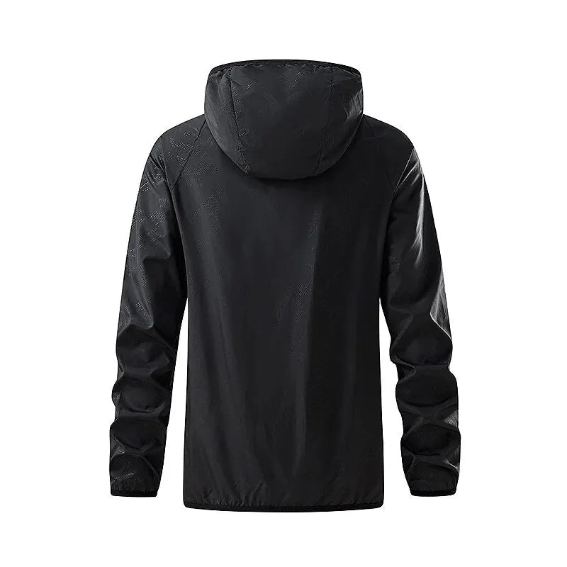 Black hooded jacket with drawstring hood, worn by a person, back view | Chaps London