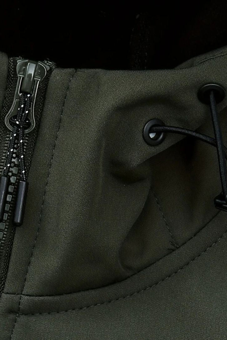 Close-up of dark green softshell jacket zipper and drawstring hood detail | Chaps London