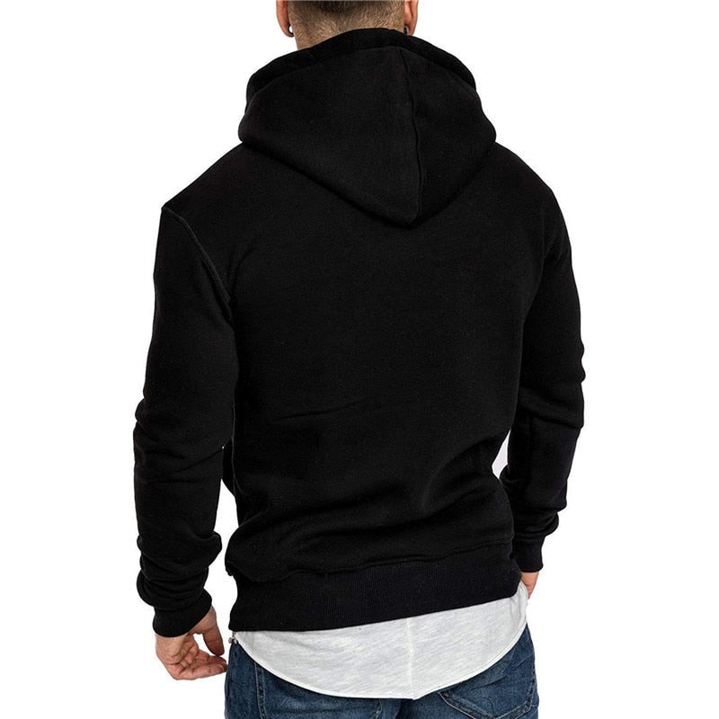 Man wearing plain black hoodie with layered white hem, back view | Chaps London
