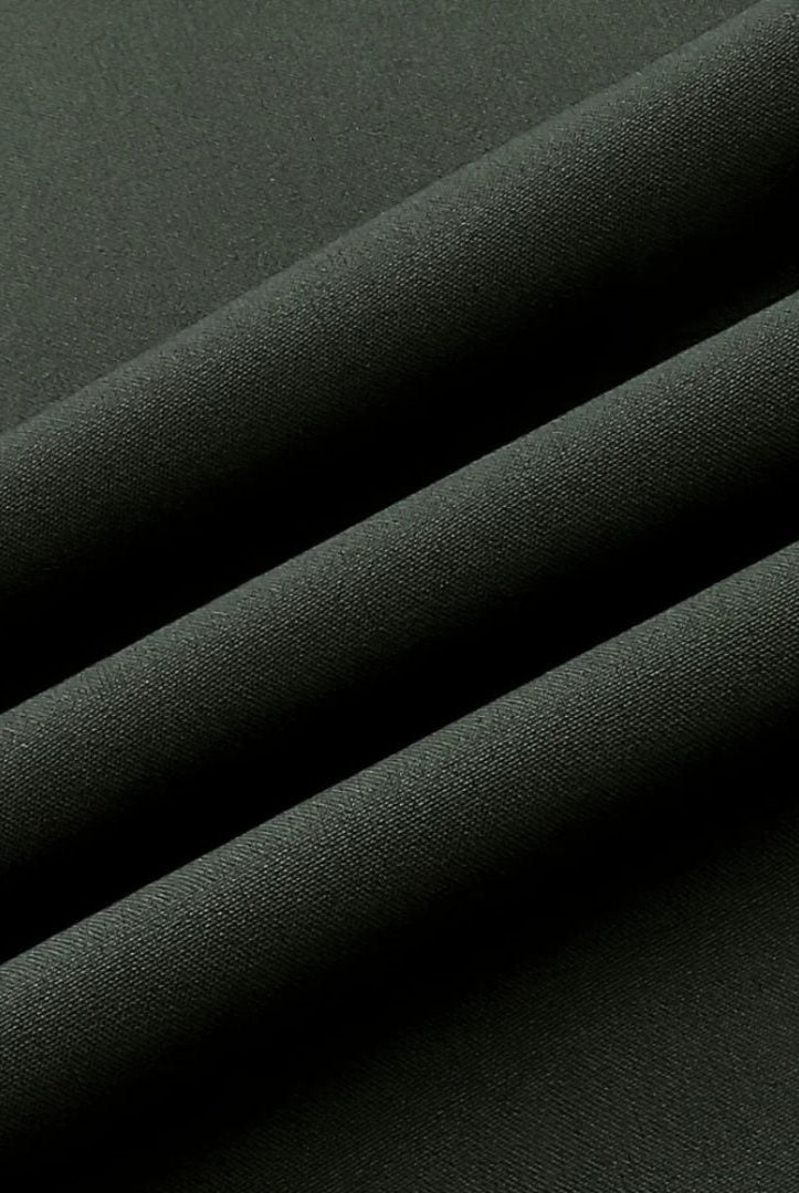 Close-up of dark gray softshell fabric with draped folds, flat texture | Chaps London