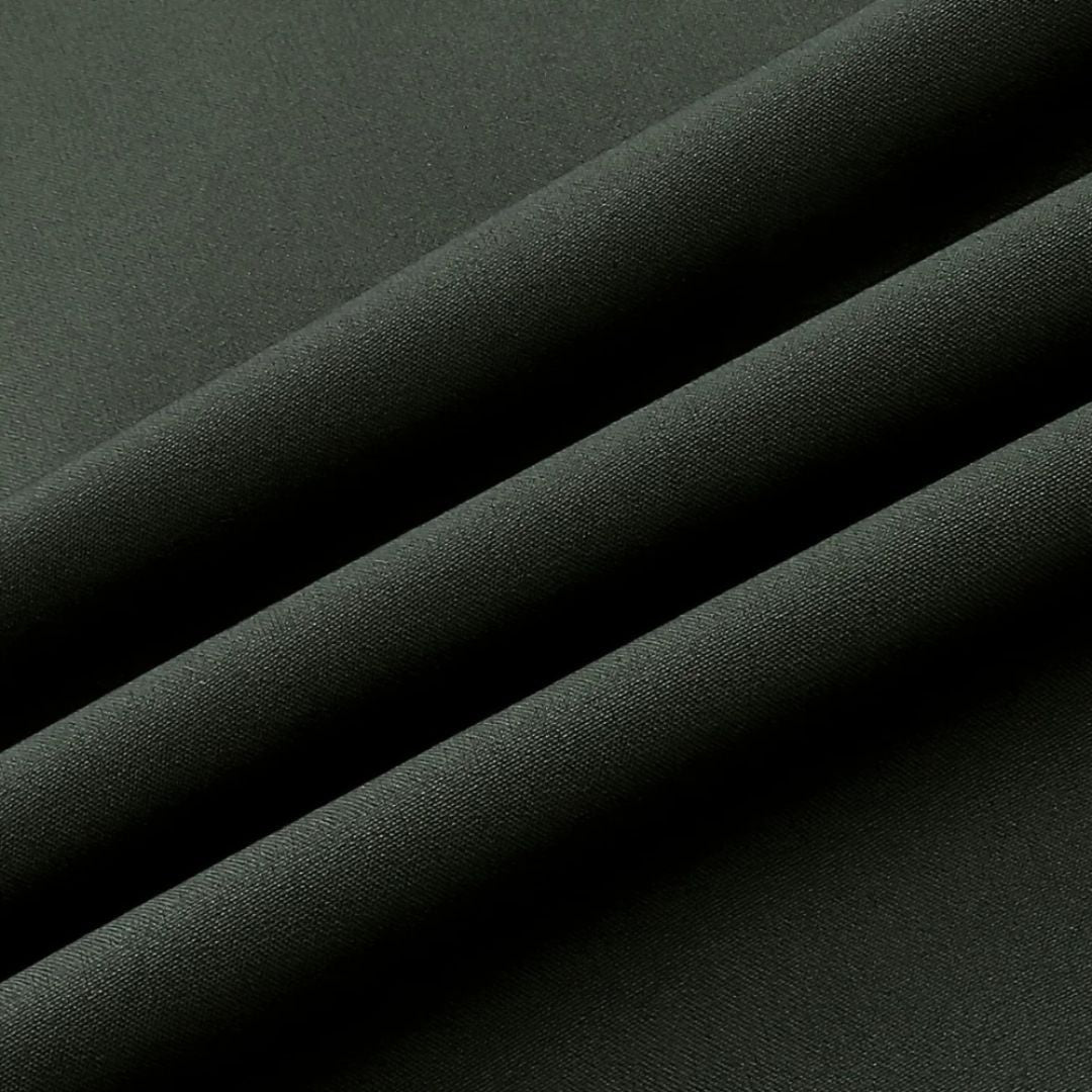 Close-up of dark gray softshell fabric with draped folds, flat texture | Chaps London