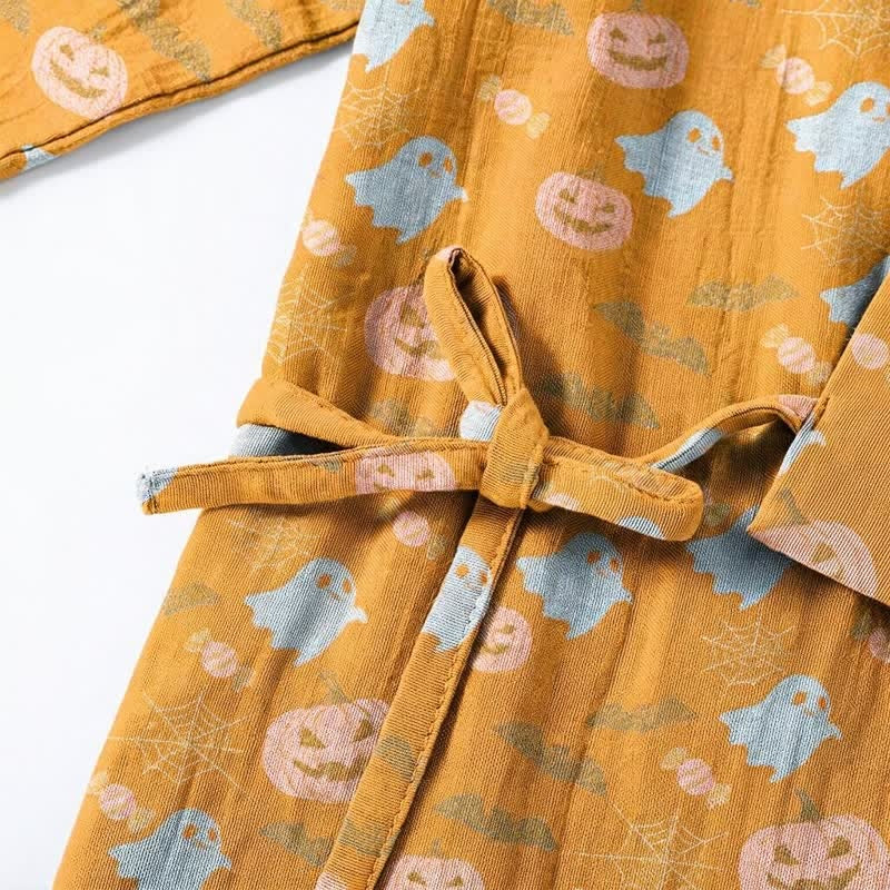 Mustard kimono robe with pumpkin and ghost print, tied belt detail shown flat | Chaps London