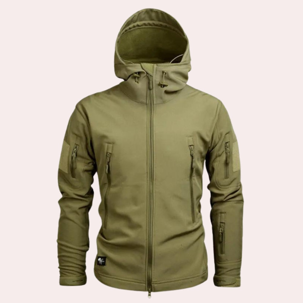 Olive green hooded softshell jacket with zip pockets, worn by a person | Chaps London