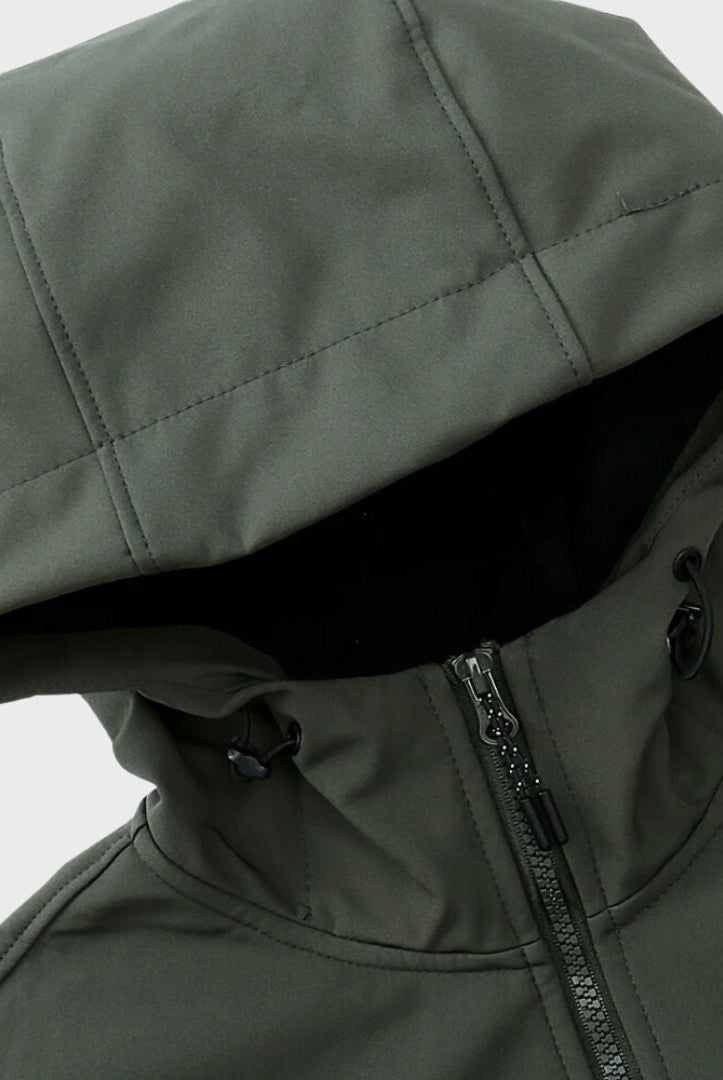 Dark olive green softshell jacket with hood, worn, close-up detail shot | Chaps London