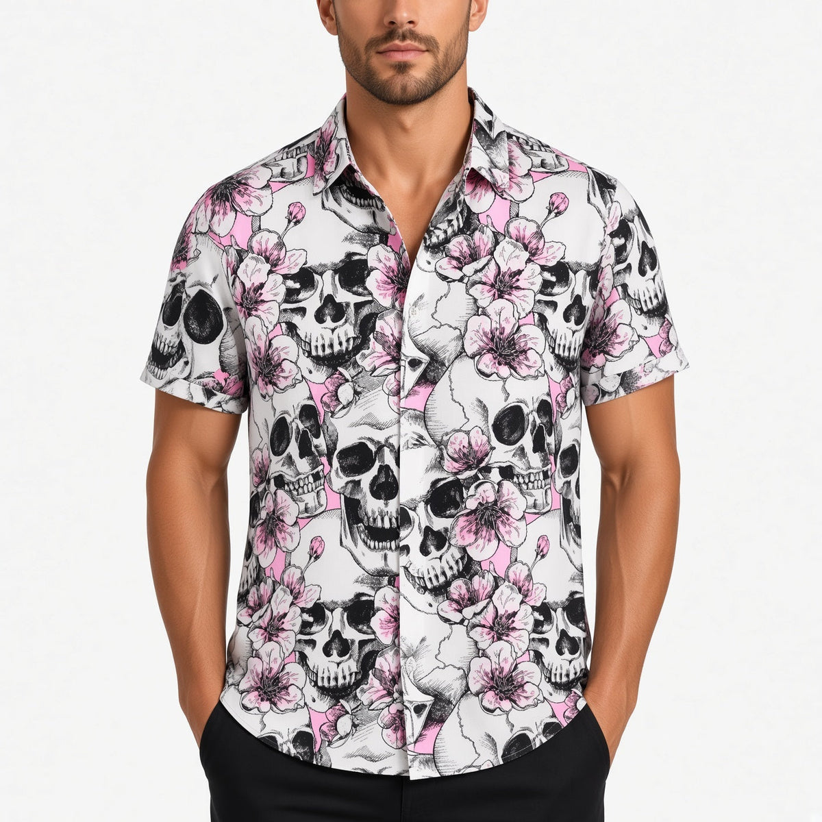 Man wearing white short-sleeve shirt with black skulls and pink floral print | Chaps London