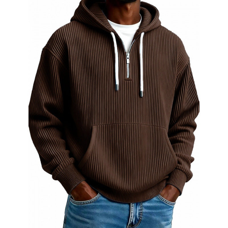 Brown ribbed half-zip hoodie worn by man, paired with jeans | Chaps London