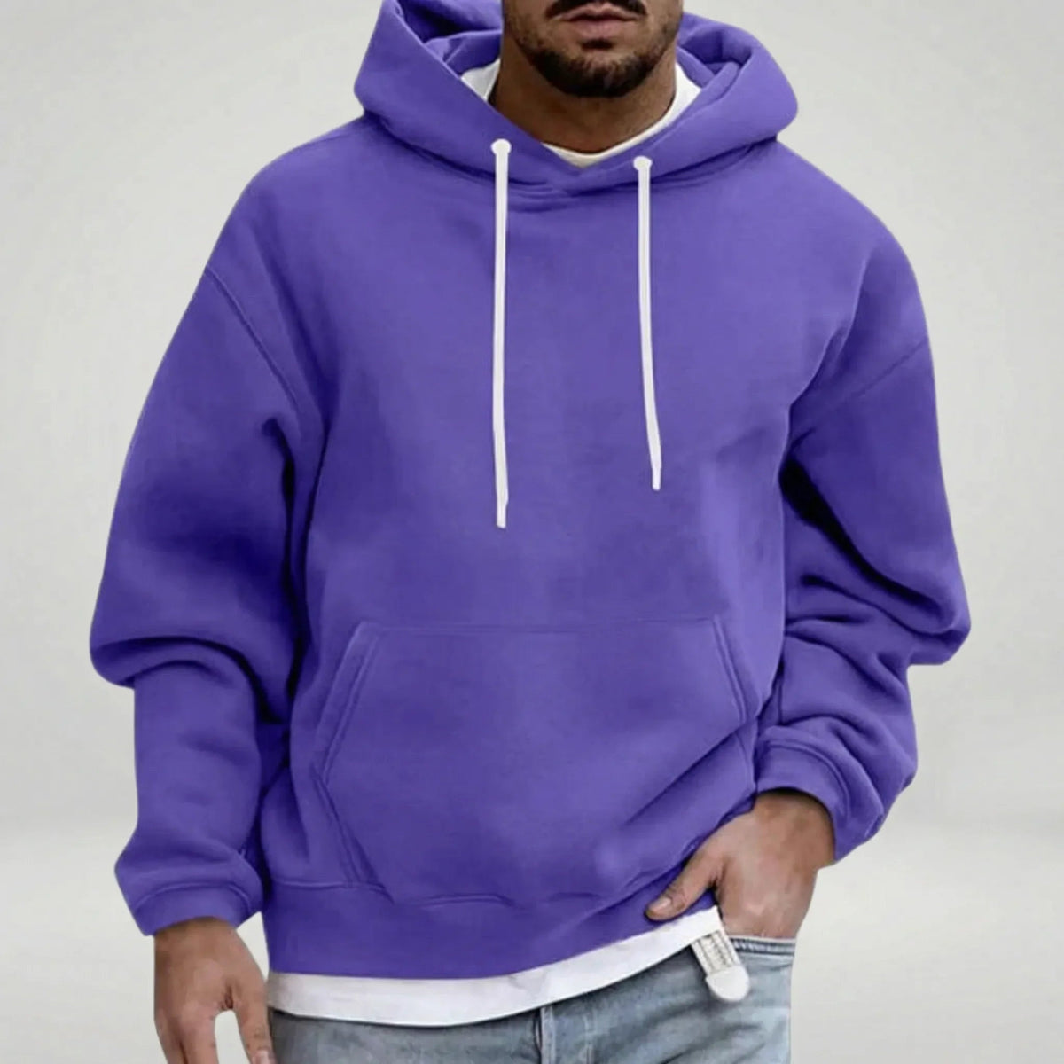 Man wearing purple hoodie with white drawstrings, layered over white shirt | Chaps London