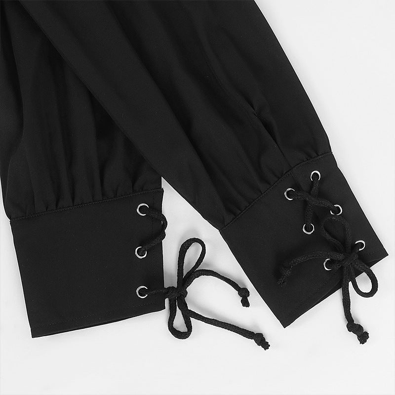 Black medieval shirt sleeve with lace-up cuff detail, close-up view | Chaps London