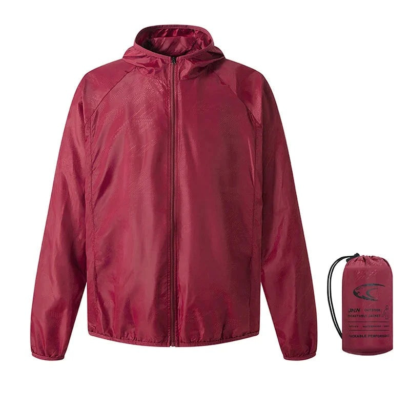 Red packable windbreaker jacket with hood, shown flat beside its matching storage pouch | Chaps London
